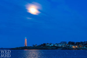 The full Pink Moon over Chandler Hovey Lighthouse